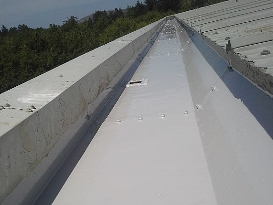 Lining of industrial metal gutters, Conwy